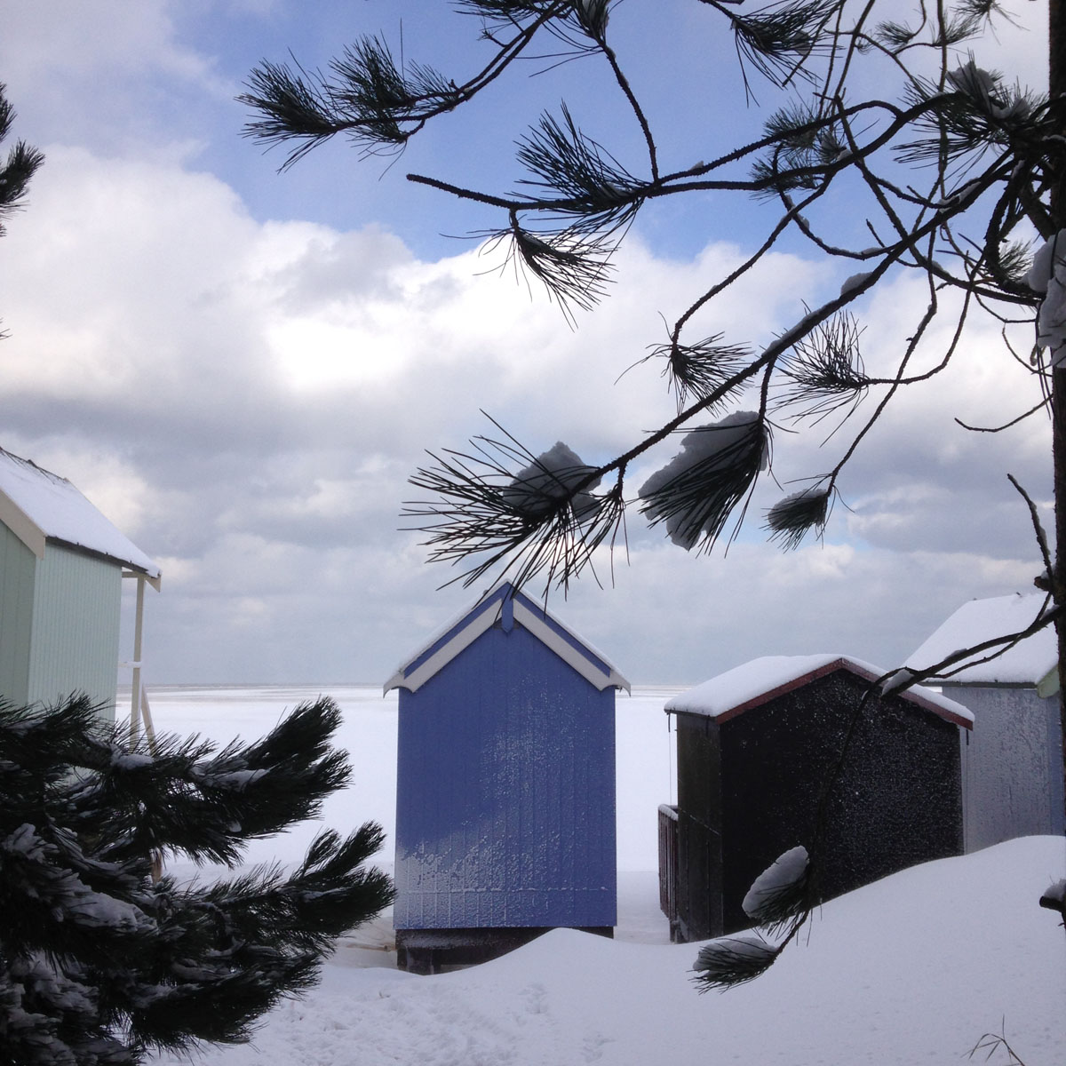 Beach huts in snow