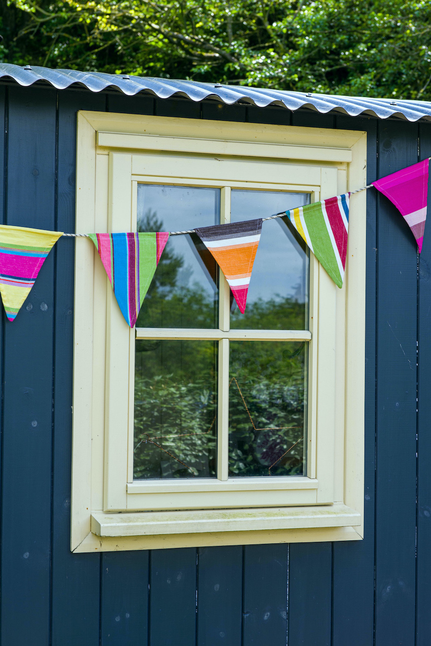 Pretty bunting at the shepherd's hut, Hut-next-the-Sea, named after Wells-next-the-Sea